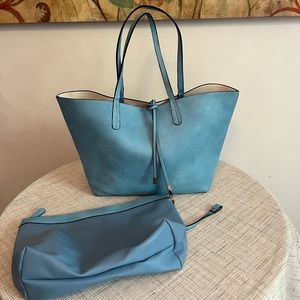 Beautiful powder blue tote with extra storage bag. NWT